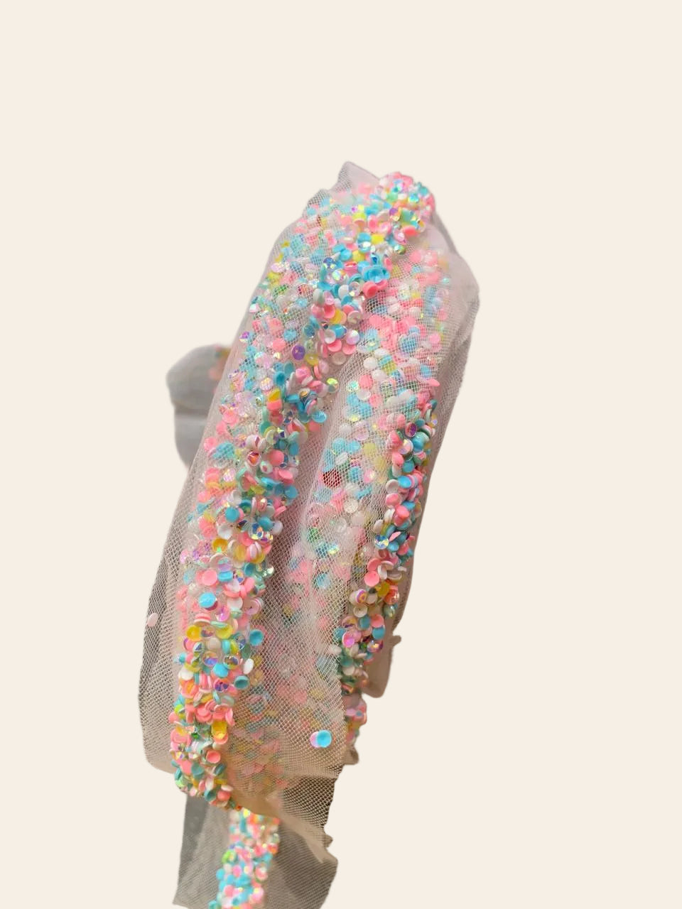 Rainbow Confetti Sequin Trim on Soft Blush Net